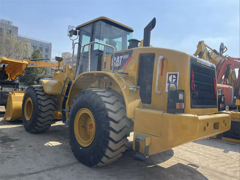 Retroescavadeira de rodas CAT 966H usada com motor Weichai, peso operacional de 23698 kg e capacidade de caçamba de 4,0 m³
